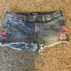 Cutoff short shorts with colorful flower design